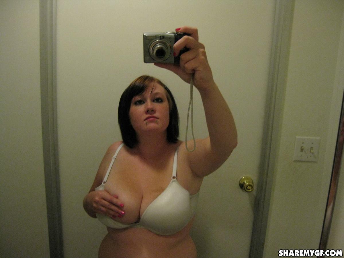 Chubby girlfriend takes selfshot pictures of her big natural tits in the mirror #60791737
