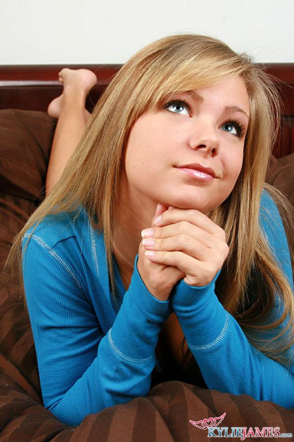 Pictures of teen star Kylie James waiting for you on the couch #58787404