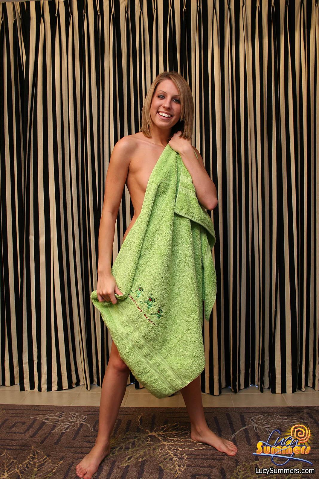 Lucy spreads out completely naked on a towel #59125499