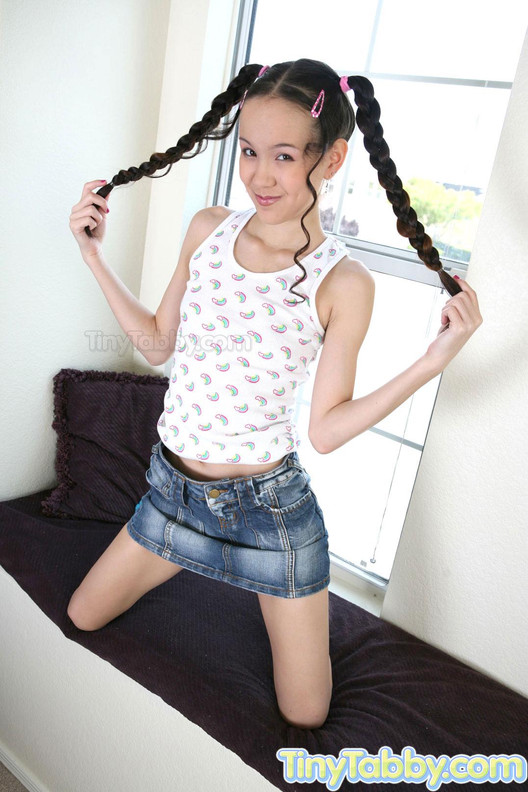 Asian teen Tiny Tabby shows you what's up her skirt and under her shirt #53069479