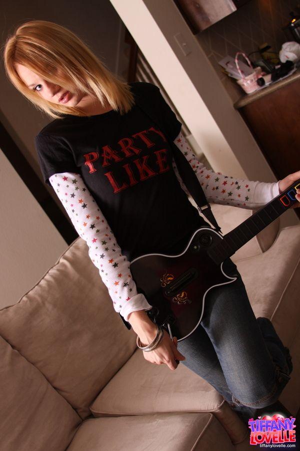 Pictures of teen amateur Tiffany Lovelle playing a hot game of guitar hero #60096631
