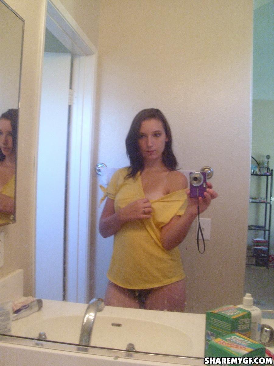 Petite girlfriend takes selfshot pictures of her small perky tits in the mirror #60791683