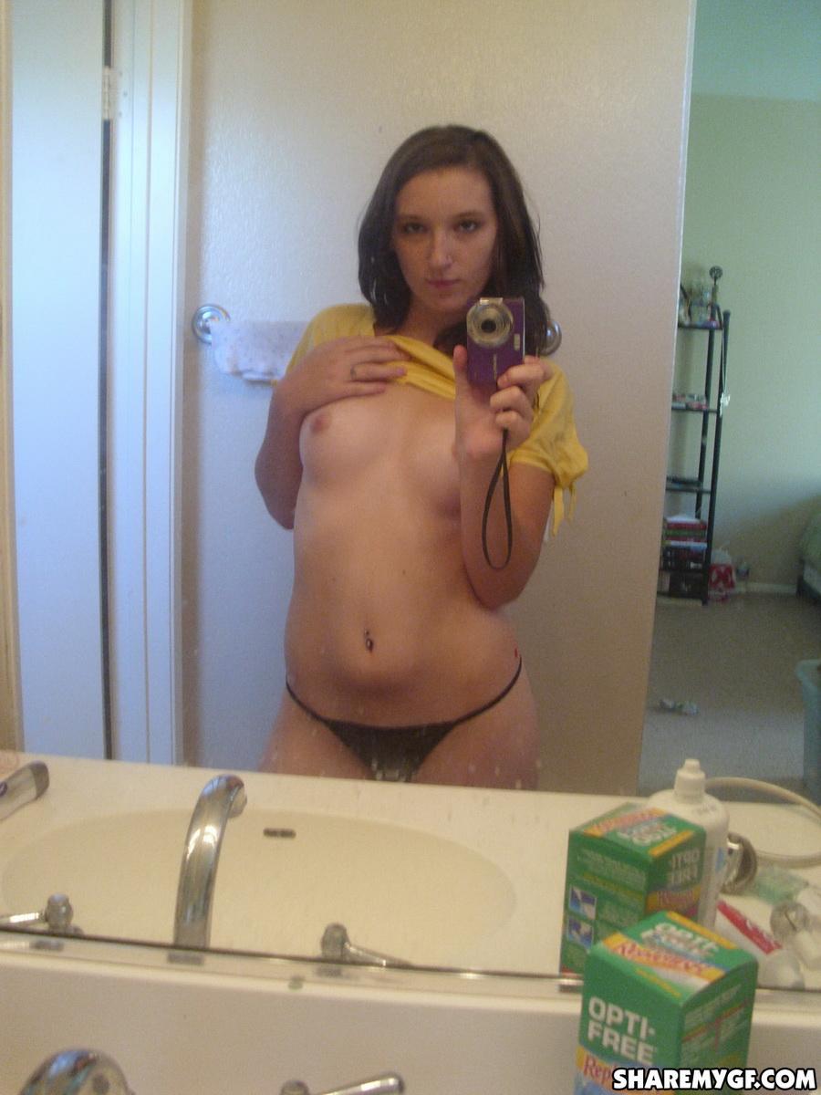 Petite girlfriend takes selfshot pictures of her small perky tits in the mirror #60791693