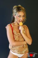 Pictures Of Blonde Teen Sarah Peachez Teasing With A Lollipop
