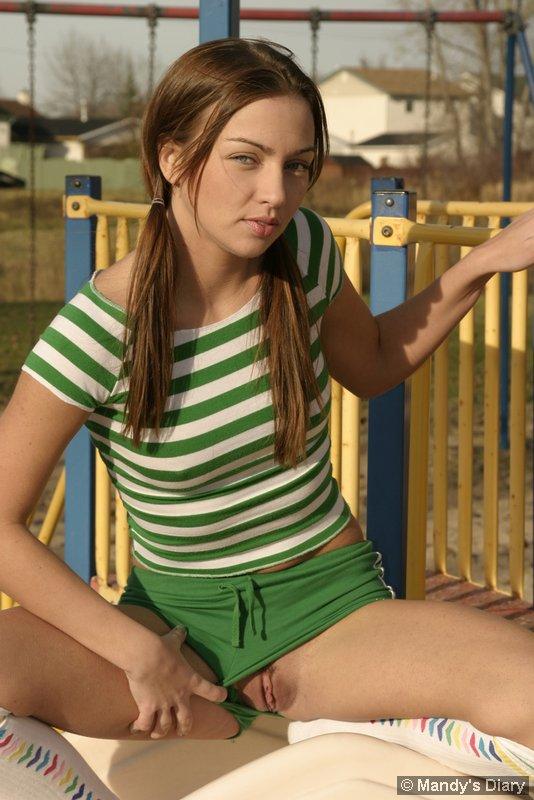Pictures of teen girl Mandy's Diary teasing in a park #59214889