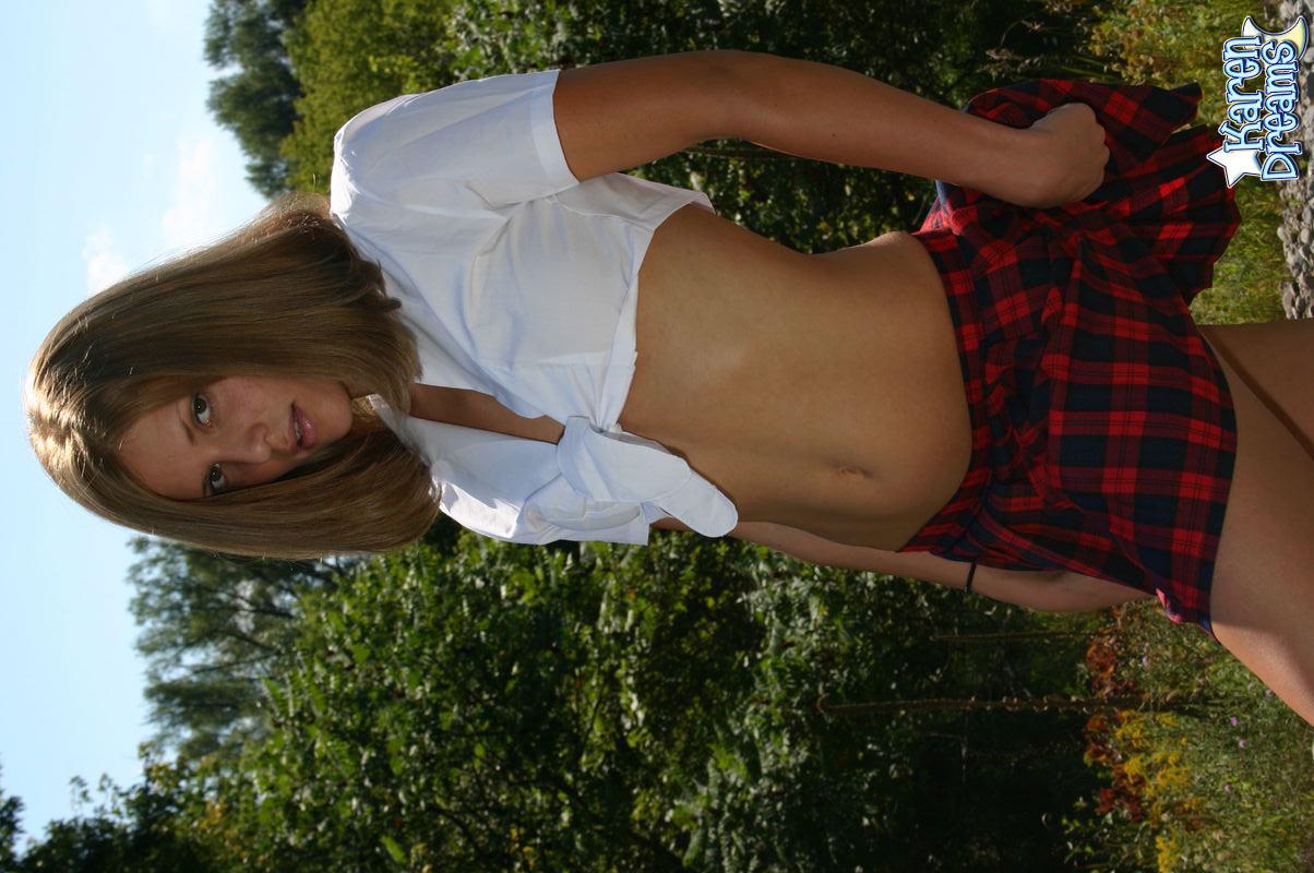 Pictures of Karen Dreams stripping out of her schoolgirl uniform #58012052
