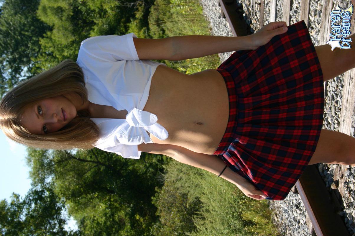 Pictures of Karen Dreams stripping out of her schoolgirl uniform #58012094