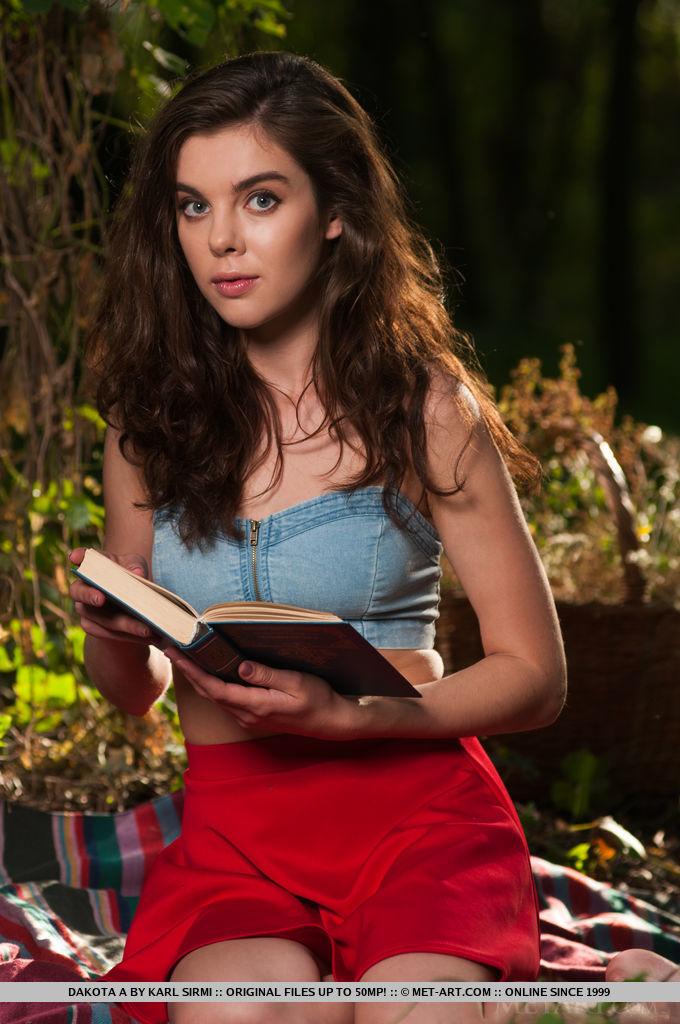 Brunette coed Dakota A gets turned on while reading a book under the tree #53925621