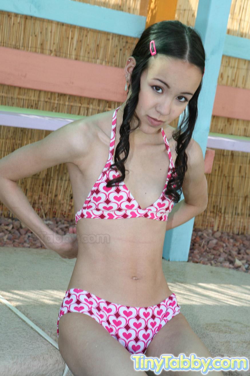 Horny teen Tiny Tabby gets nude for you in the pool #53071447