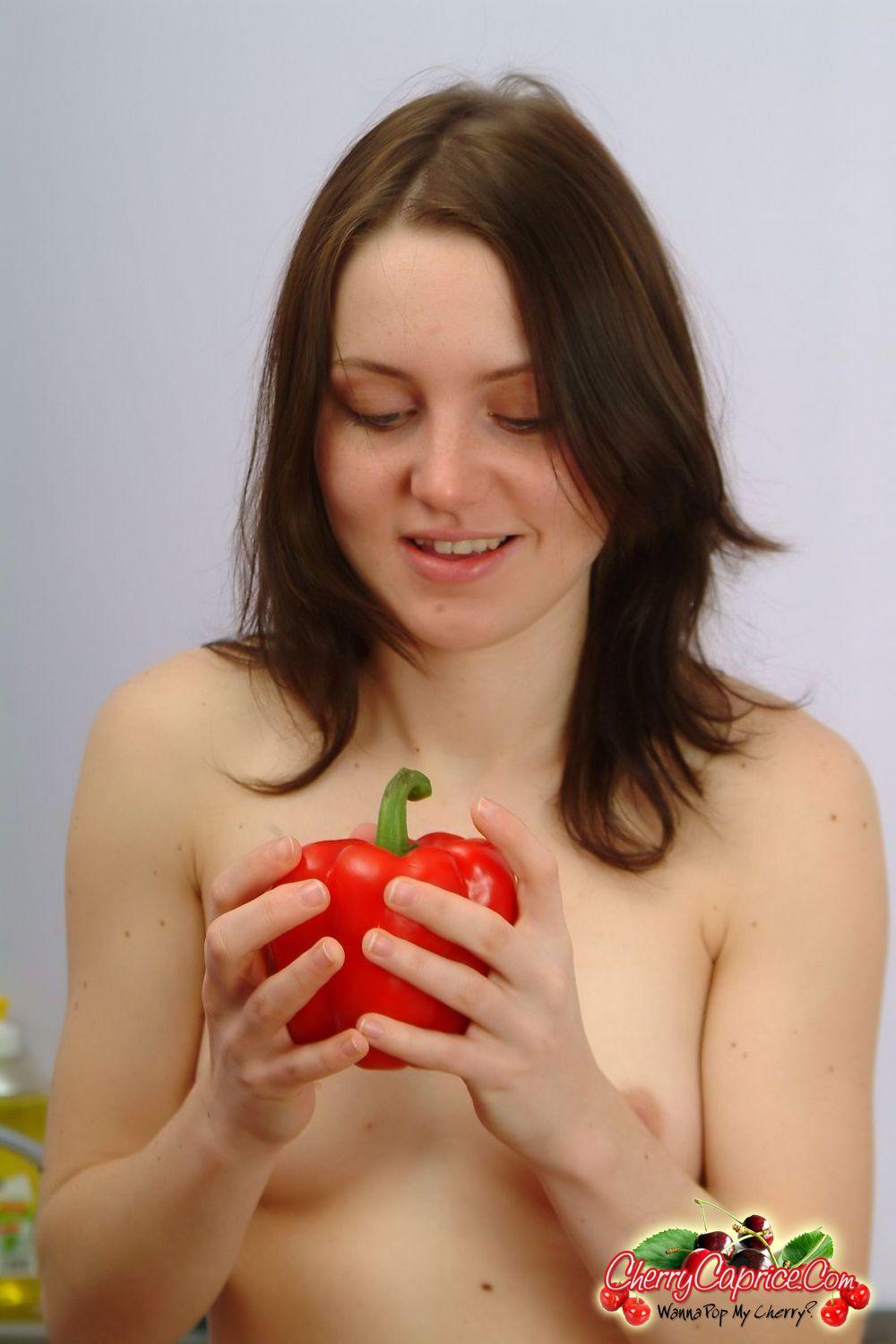 Pictures of Cherry Caprice eating a pepper #53774672