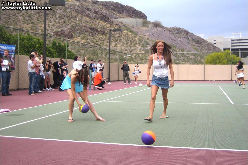 Teen girls get a little wild on a tennis court #60070415
