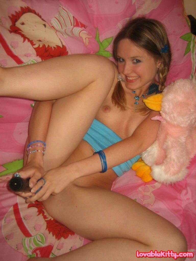 Pictures of Lovable Kitty playing with her pussy #58762948