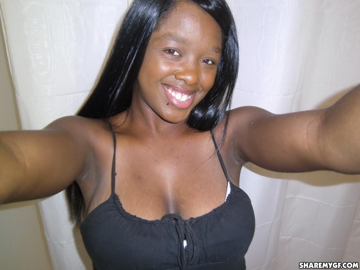 Busty ebony girlfriend takes selfshot pictures of her big tits in the mirror #60790015