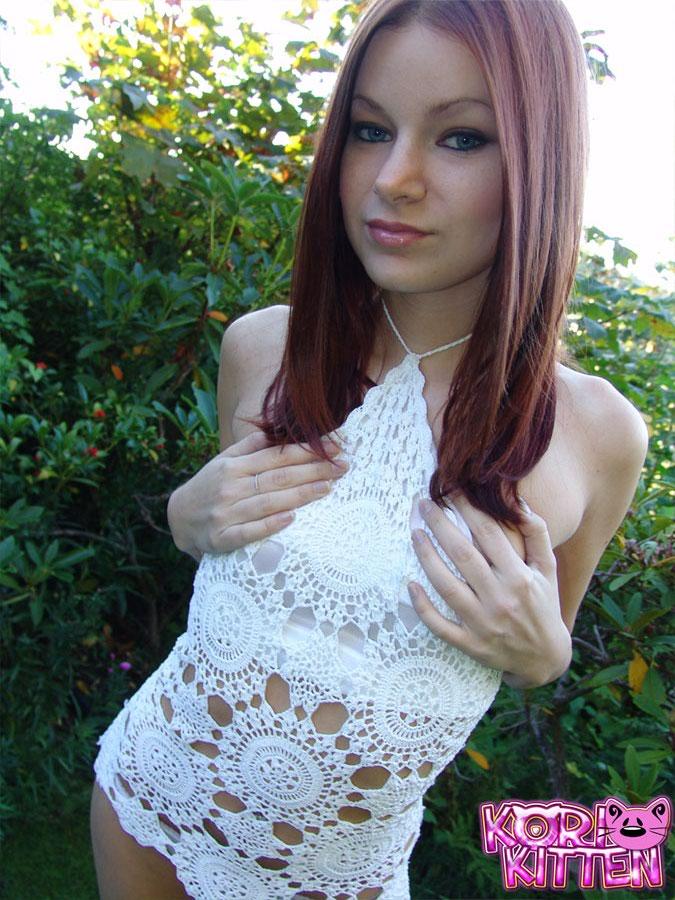 Redhead beauty Kori teases outside in white #59583524