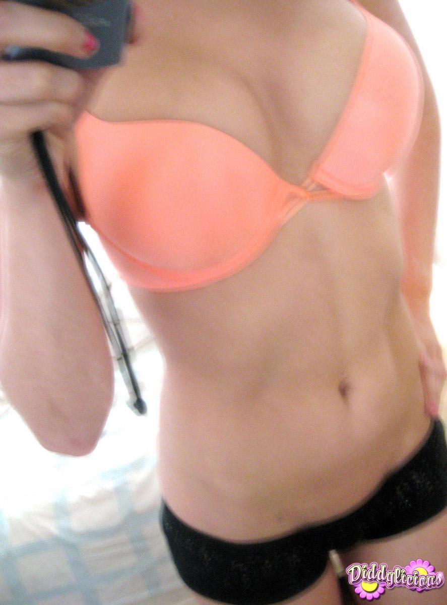 Diddy takes self pictures of herself in a bright orange bra #54054487