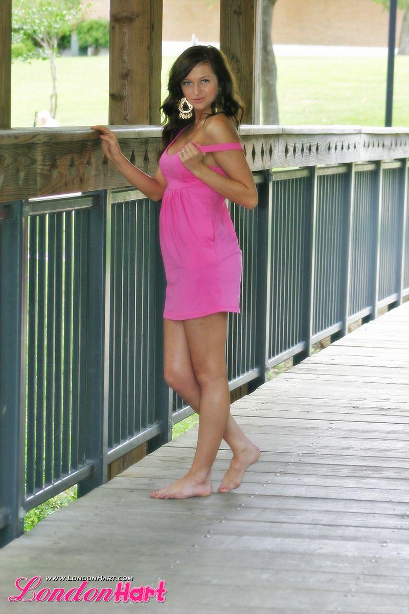 Pictures of teen girl London Hart teasing in a pink dress #59081717