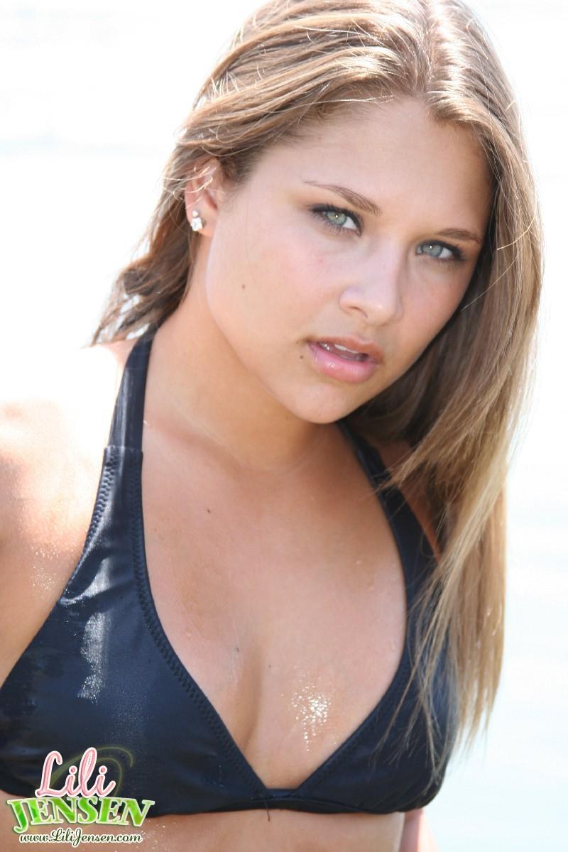 Lili Jensen has some fun in the ocean in a tiny bikini #58946282