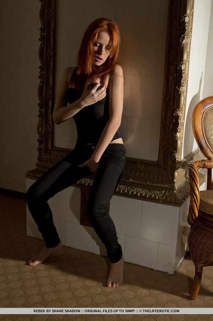 Redhead model rebek slides down her pants to finger her wet pussy
 #60863942