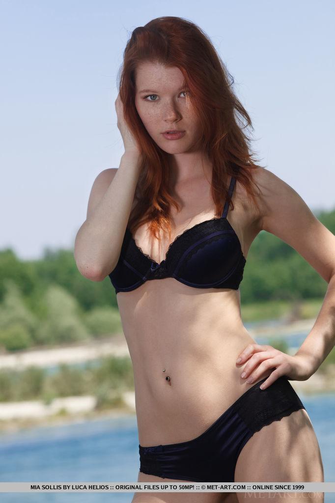 Stunning redhead Mia Sollis plays naked by the river #59519242