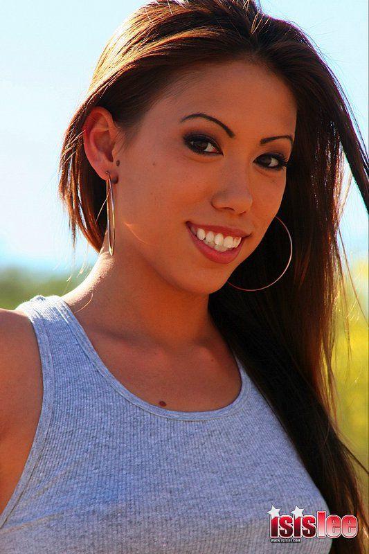 Pictures of teen chick Isis Lee flashing at a park #54946620