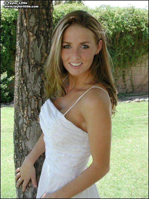 Pictures of teen hottie Taylor Little stripping by a tree #60068281