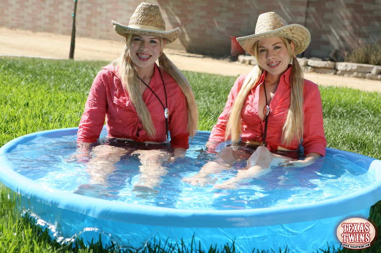 Hot twin sisters The Texas Twins want you to come cool off with them in the pool #60090467