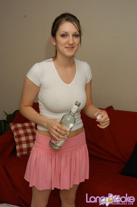 Lana covers her white shirt with rum #58814003
