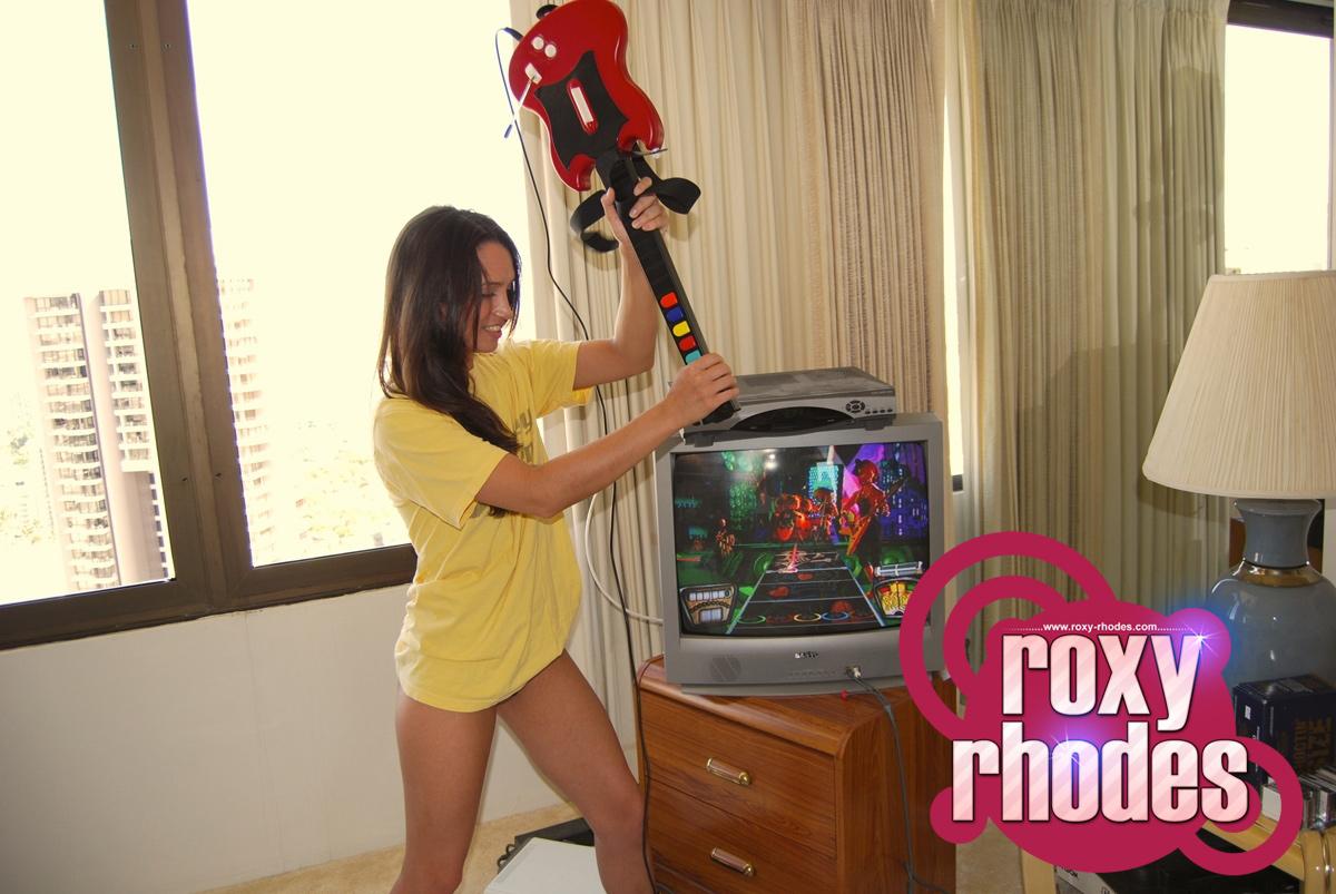 Pictures of teen girl Roxy Rhodes playing a sexy game of guitar hero #59880620
