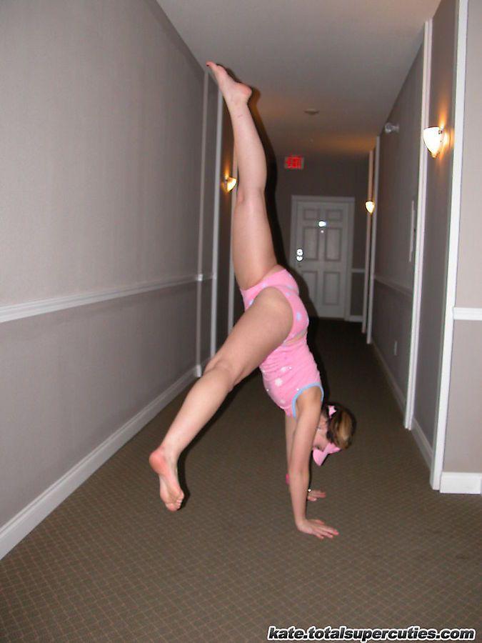 Pictures of teen cutie Katie being a tease in a hotel hallway #58053073