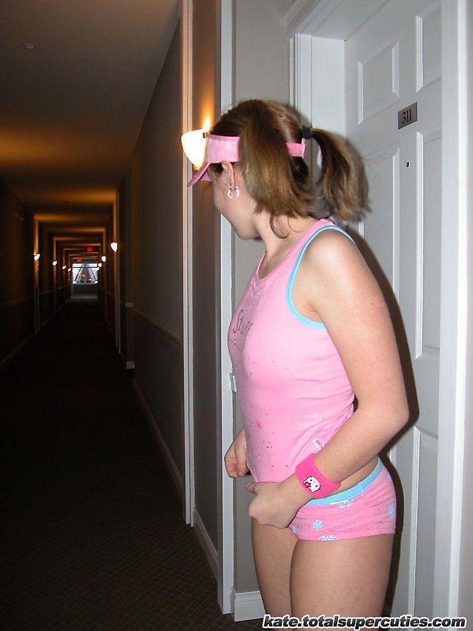 Pictures of teen cutie Katie being a tease in a hotel hallway #58053157