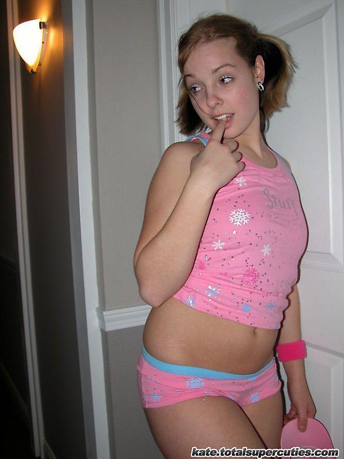 Pictures of teen cutie Katie being a tease in a hotel hallway #58053216