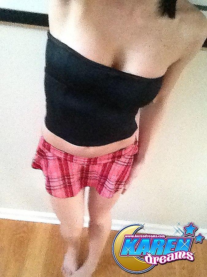 Pictures of Karen Dreams teasing in a plaid skirt #55981408