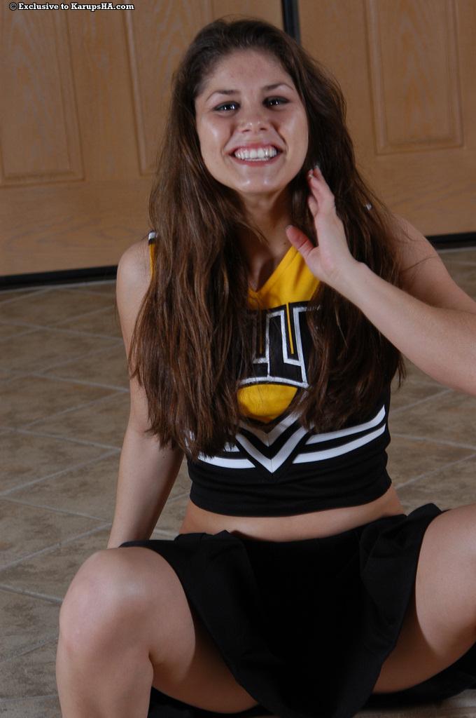 Stunning brunette girl Cheerleader shows it all off #60535574