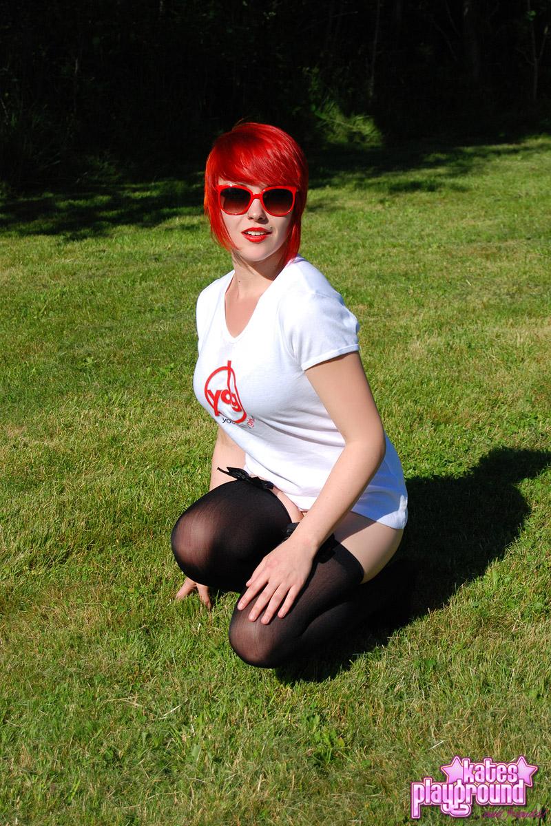 Redhead teen Sabrina teases as she dumps cold water all over her white shirt outdoors #60572735