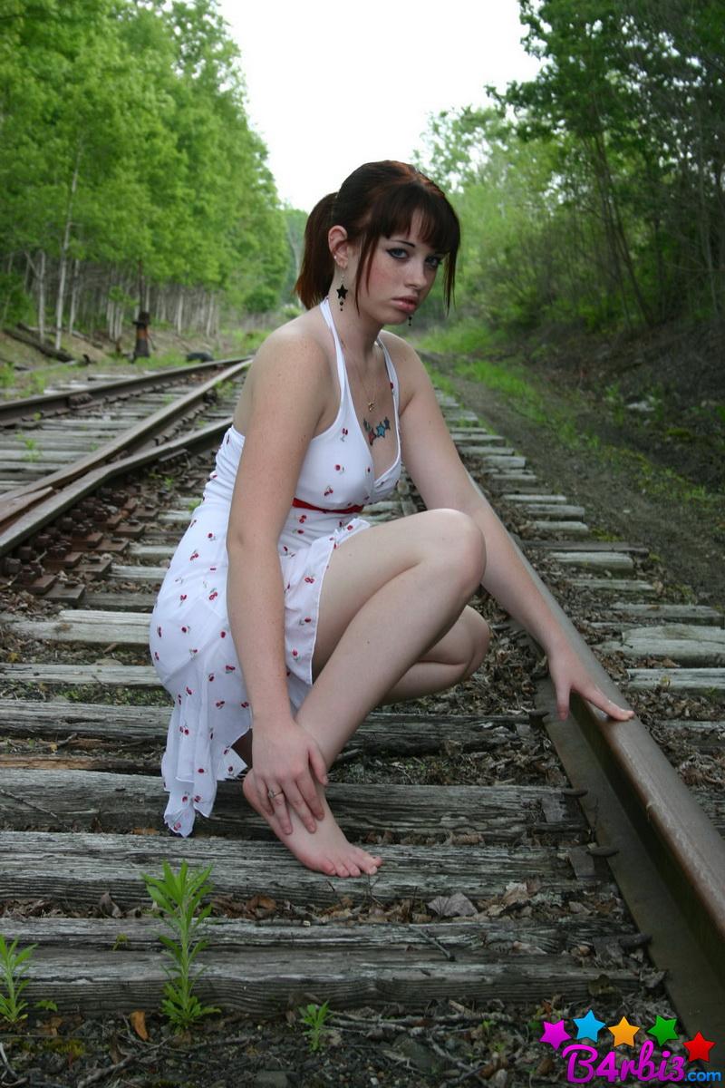 Barbie teases as she poses on the train tracks in a skimpy sundress #53414261