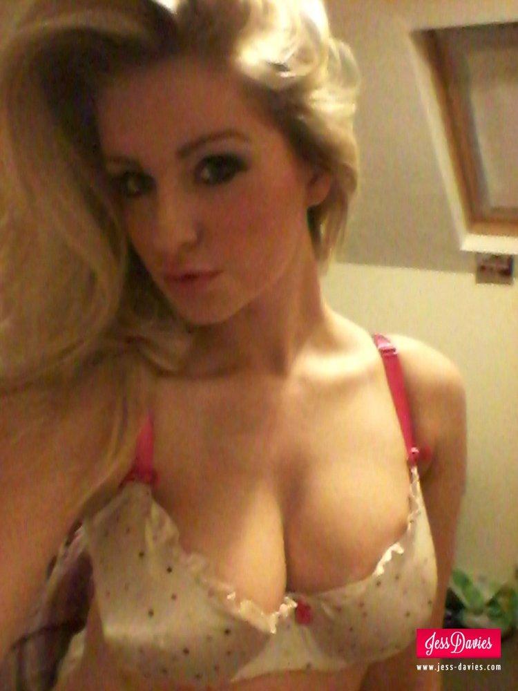 Jess Davies Strips From Her Spotted White Lingerie To Reveal Her Big Round Boobs Porn Pictures