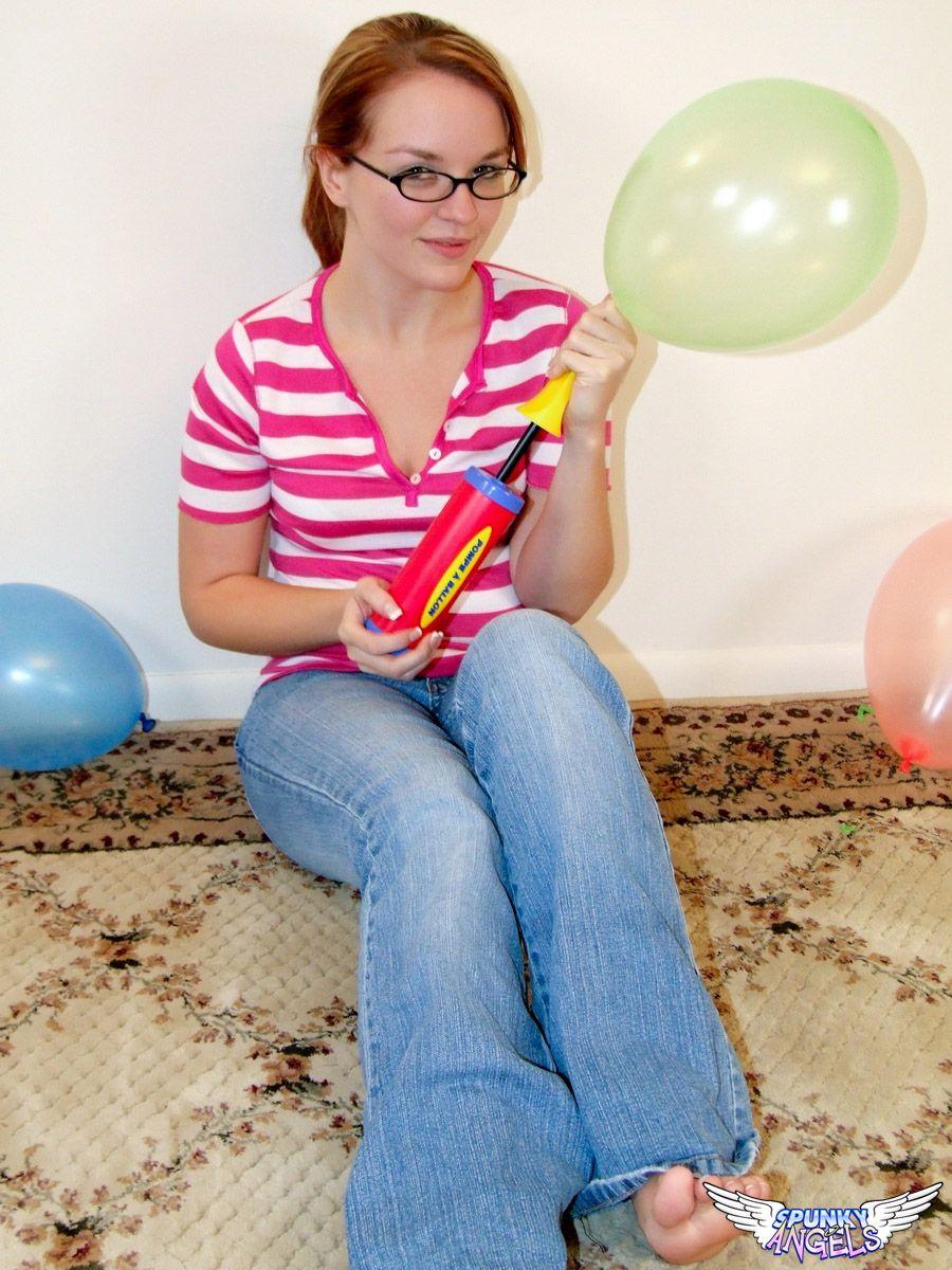 Pictures of a cute teen in glasses and balloons #60816306