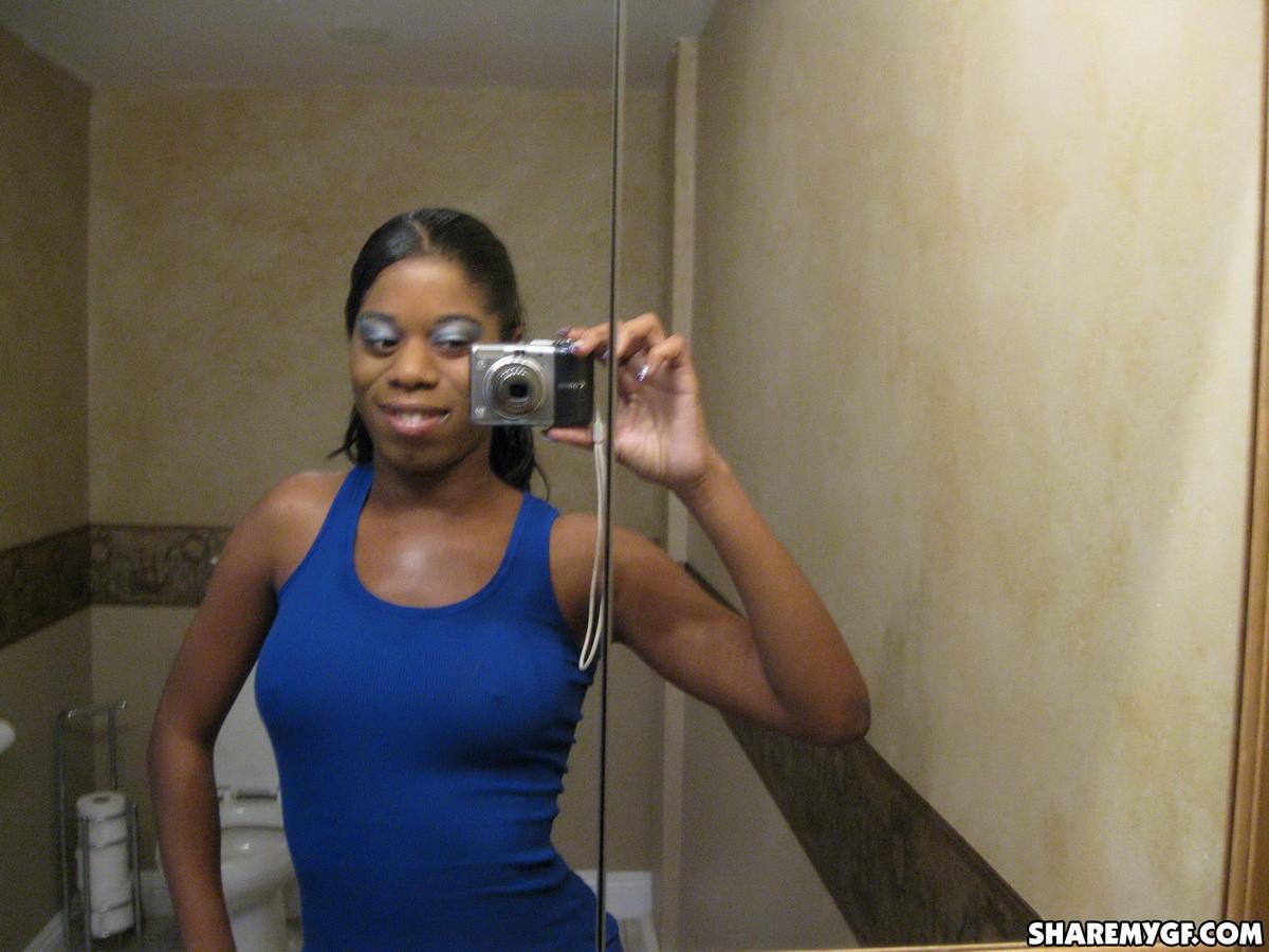 Busty black girlfriend shows off her perfect tits while taking selfshot pictures #60790787