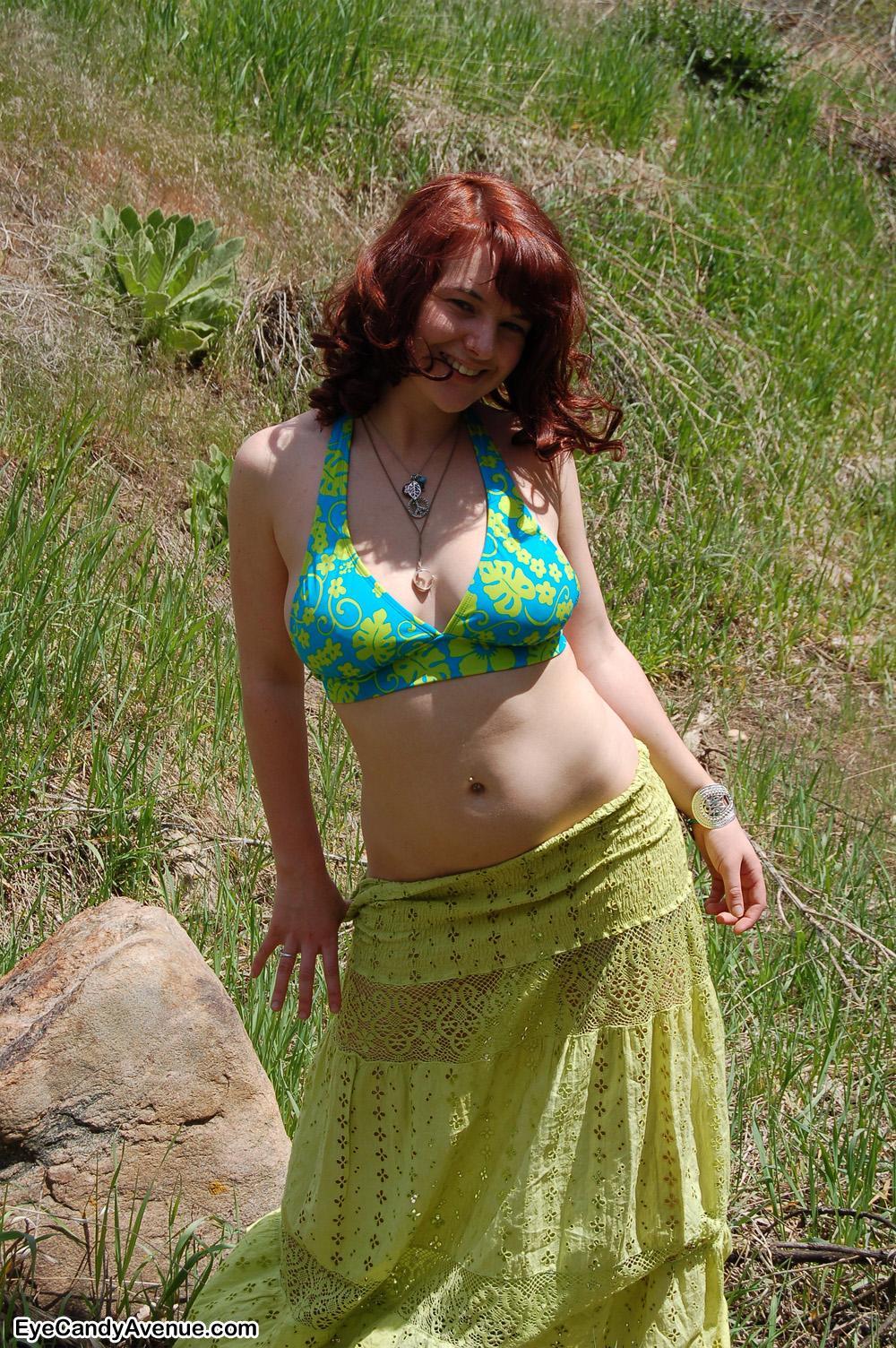 Busty redhead teen Ireland flashes her natural titties in the mountains #60375348