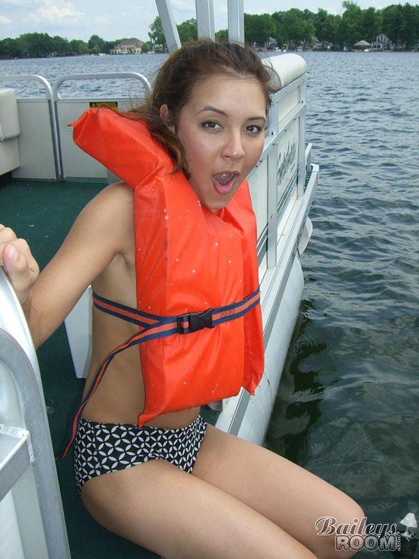 Pictures of teen cutie Bailey's Room exposing her boobs on a boat #53404964