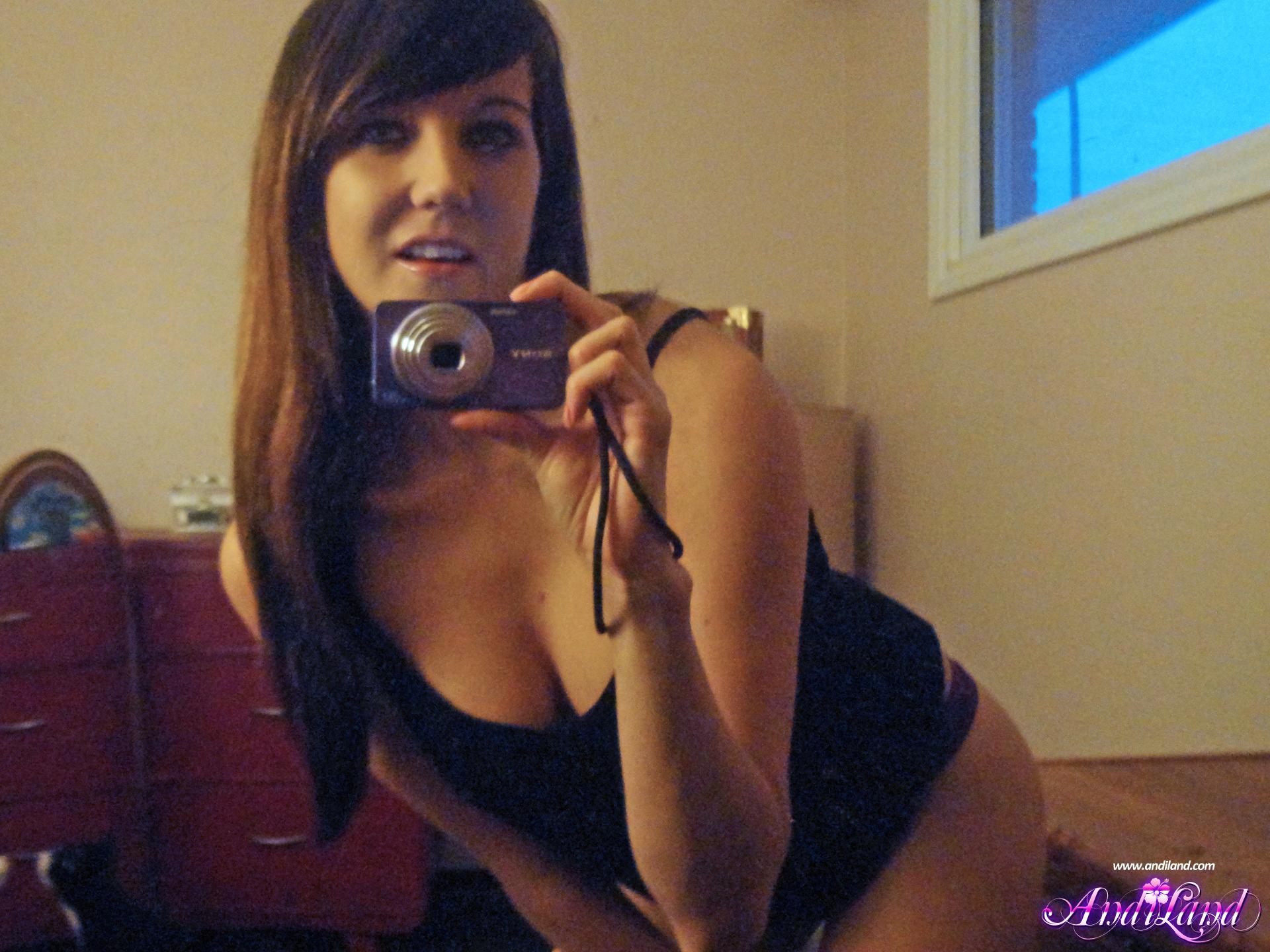 Pictures of Andi Land giving you some sexy self shots with her camera