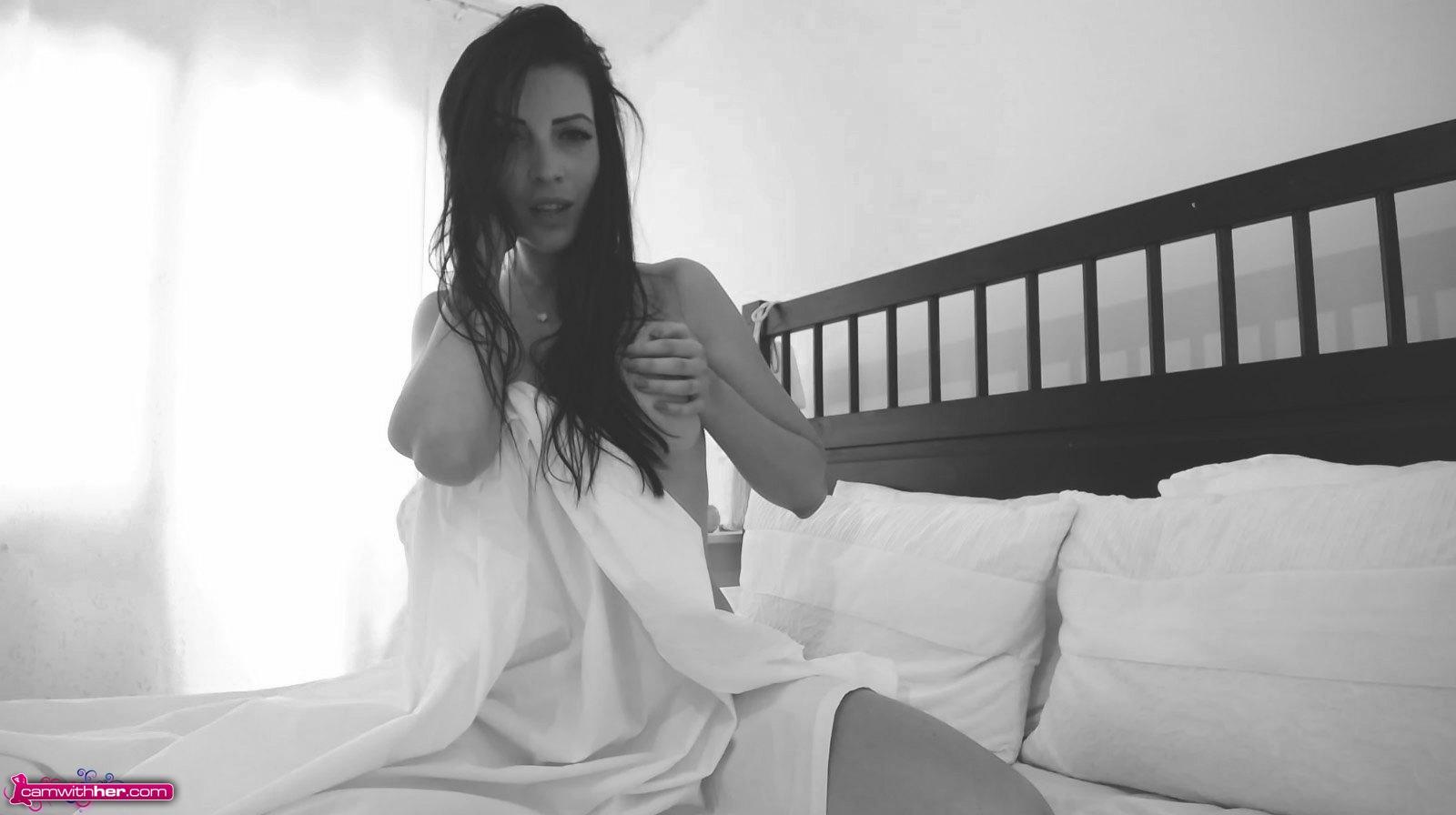 Katherine Knowles poses naked on her bed in black and white #58077110