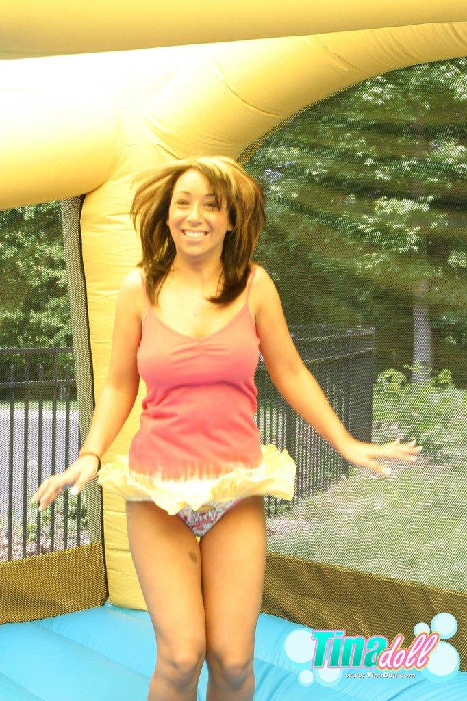 Tina Doll enjoying tit bouncing fun in an inflatable #60101175