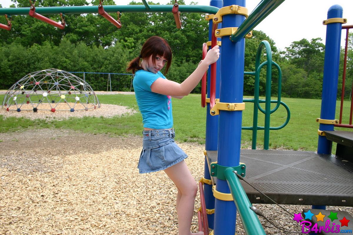 Cute tease Barbie shows off her perfect perky tits and tight round ass at the playground #53414234