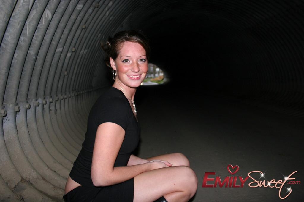 Pictures of Emily Sweet exposing her tits in a tunnel #54239781
