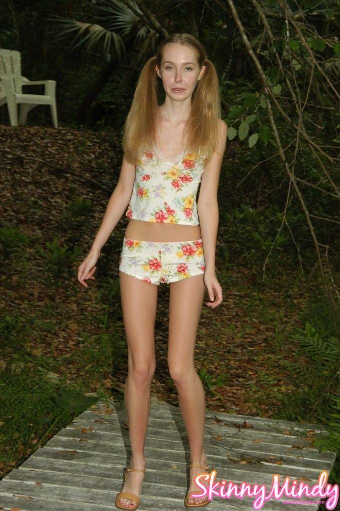 Pictures of teen Skinny Mindy teasing outside #59978025