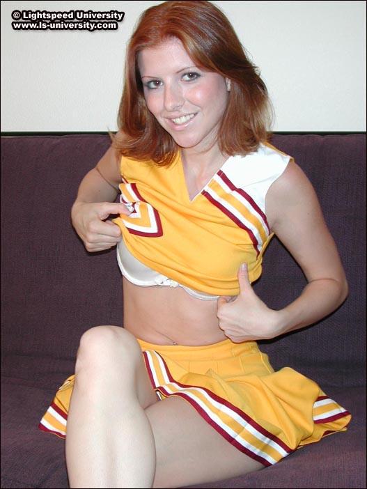 Pics of a hot redhead cheerleader getting naked for you #60577622