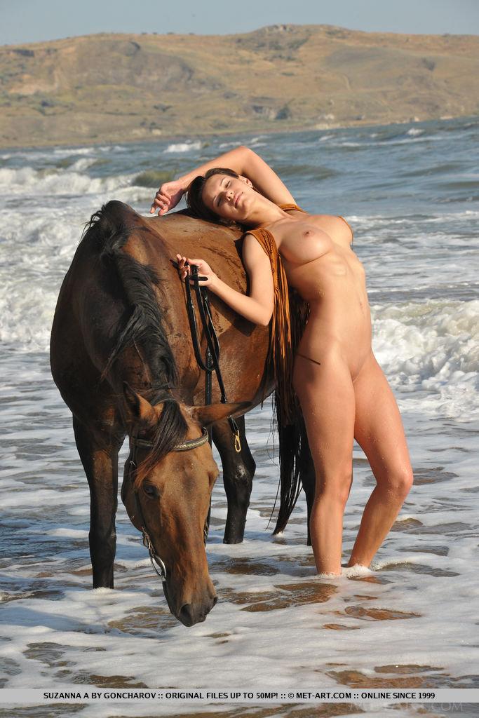 Suzanna A horse-back rides naked on the beach #60023986