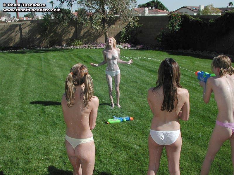 Pictures of teens soaking each other outside #54075472