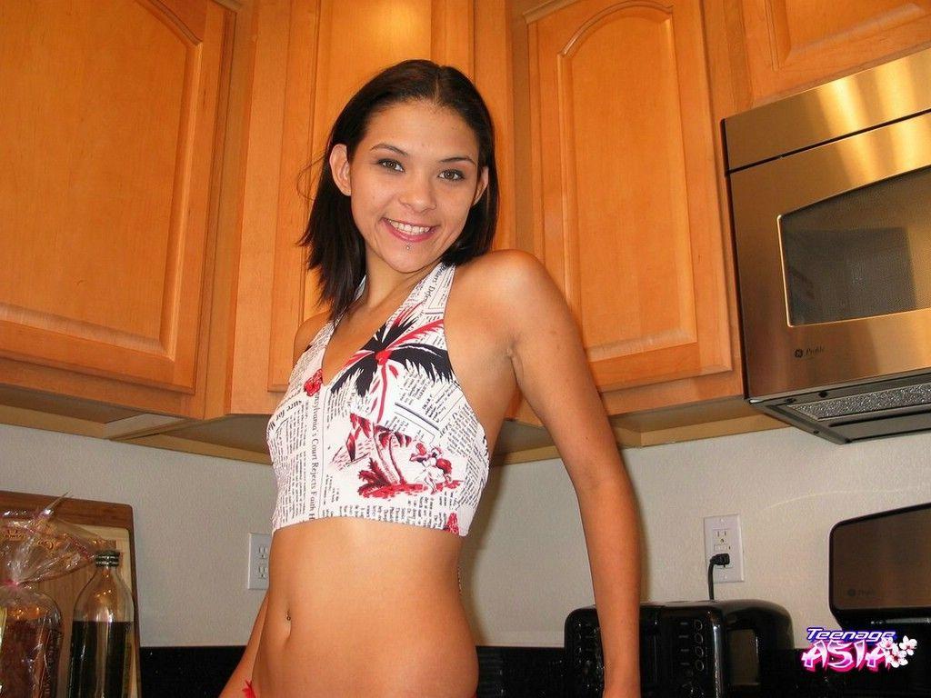 Pictures of teen babe Teenage Asia showing off her hot ass #60082844